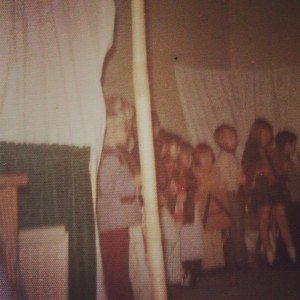 1975 Christmas Pageant. I'm the one in the homemade, red, double-knit suit.